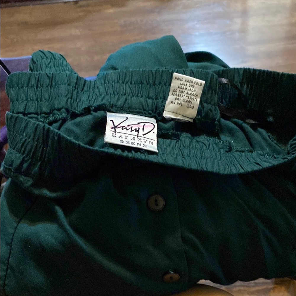 Green skirt with buttons down the front.